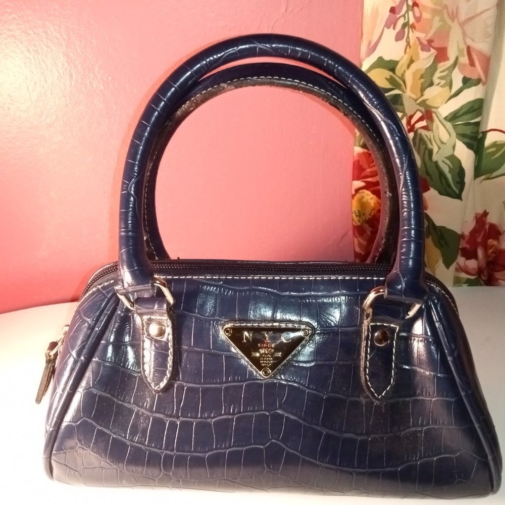 BLUE NYC HANDBAG TRIMMED IN SILVER HARDWARE AND DOUBLE ZIPPERS
